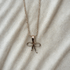 Minimal Rose Gold Bow Pendant