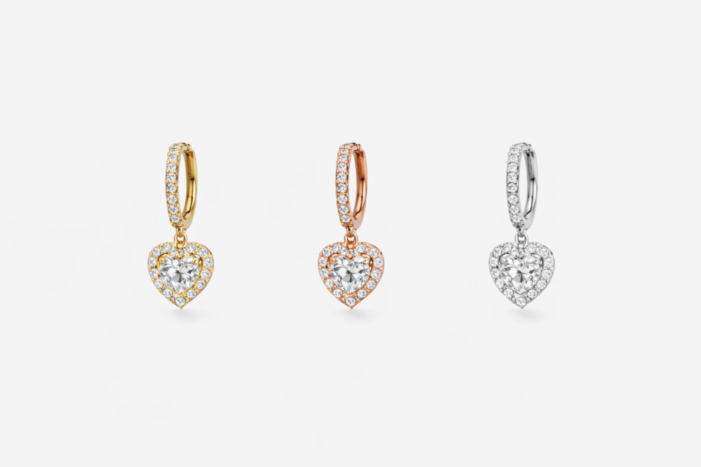 Amora heart-shaped huggie earrings made from 925 Sterling Silver with solitaire stone, available in Rose Gold, Gold, and Silver