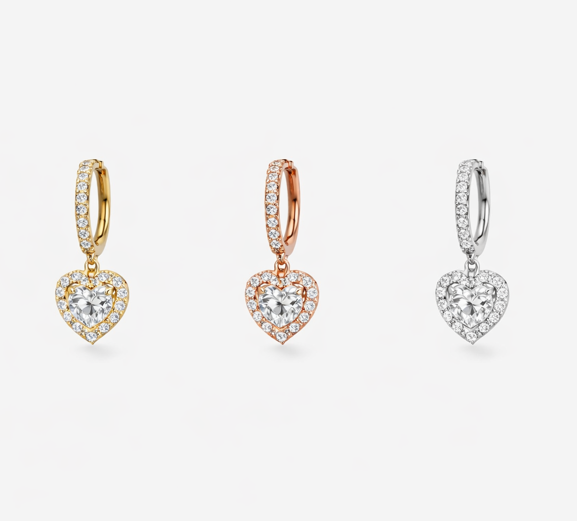 Amora heart-shaped huggie earrings made from 925 Sterling Silver with solitaire stone, available in Rose Gold, Gold, and Silver