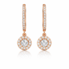 Circular rose gold huggie earrings with silver solitaire stone made from 925 Sterling Silver