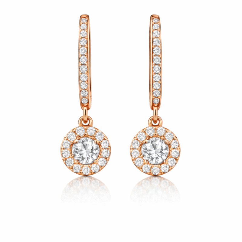 Circular rose gold huggie earrings with silver solitaire stone made from 925 Sterling Silver