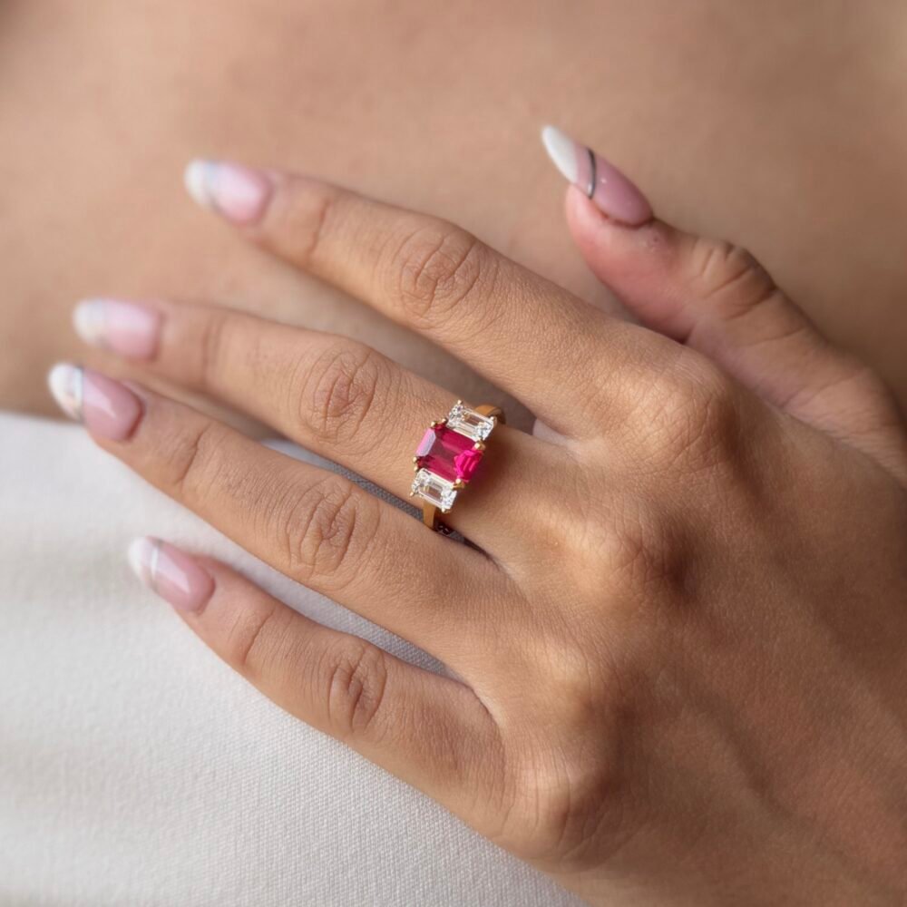 925 silver ring with red cubic zirconia stones on a gold-plated band, elegant minimal design