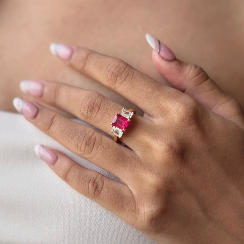 925 silver ring with red cubic zirconia stones on a gold-plated band, elegant minimal design
